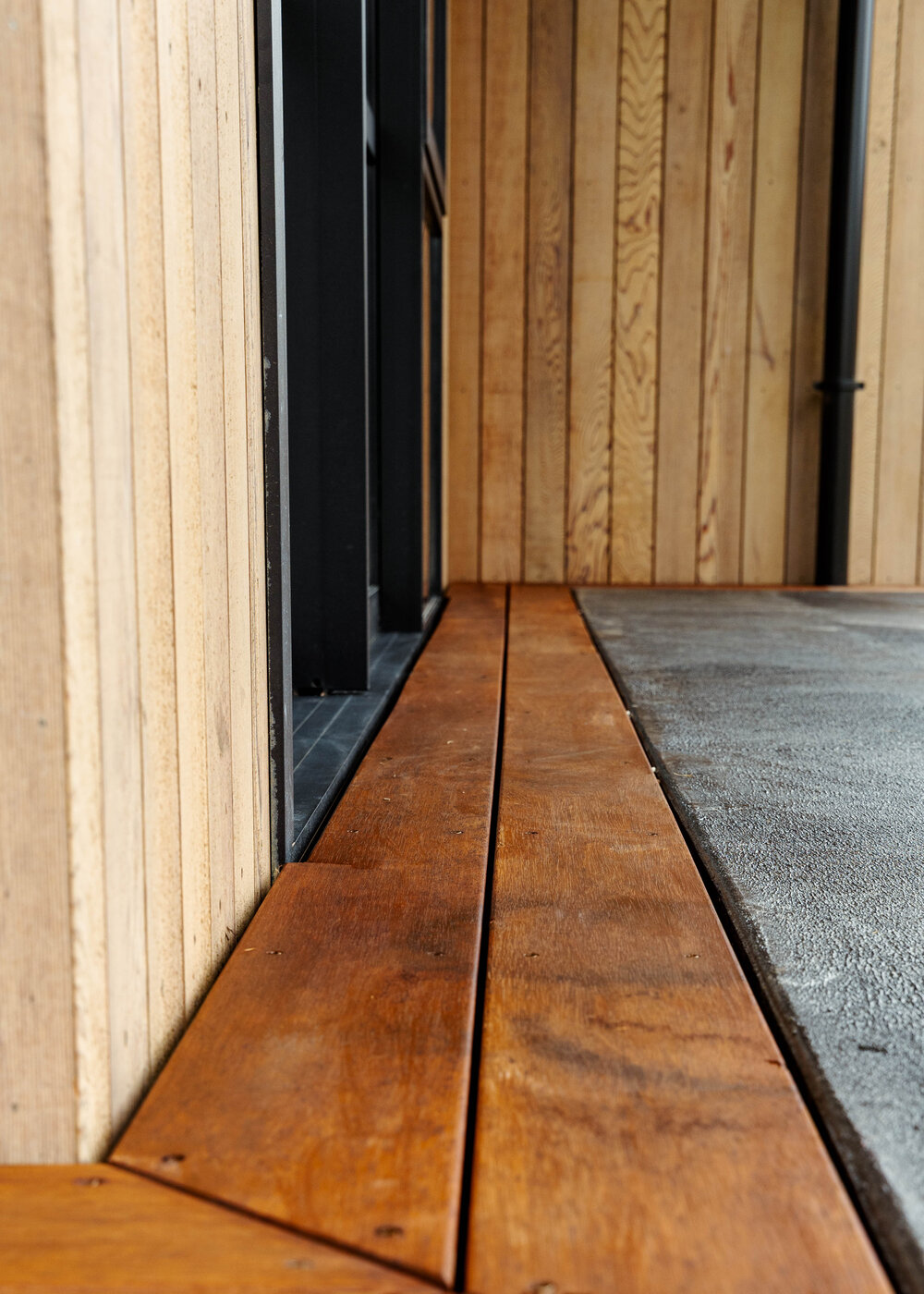 Flush deck threshold detail showing seamless door transition